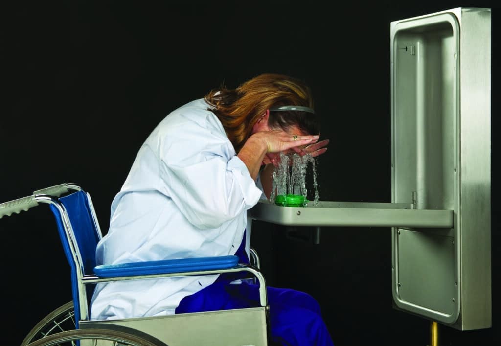 Barrier-free, wall-mounted eye wash station in a laboratory 